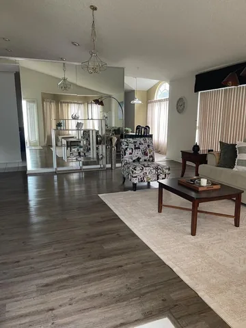 Open living area with dining space and sliding doors